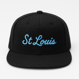 Black cap with 'St Louis' embroidered in blue on a white background