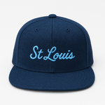 Navy blue cap with 'St Louis' embroidered in light blue on a white background